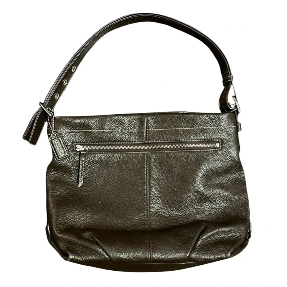 Coach brown leather hobo bag with light purple interior!
